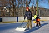 Jen cleaning the ice at Campbell Park Rink